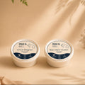 Two containers of Woof & Cook pet food on a beige background